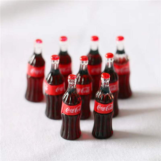 Mini botella de Coca Cola